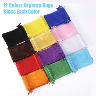 El color mezclado 4x6 avanza lentamente las bolsas de la joyería del lazo para el regalo del favor de la Navidad del banquete de boda