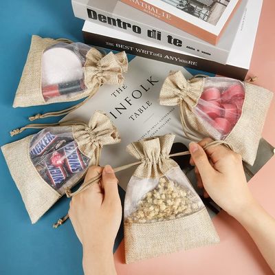 Bolsas escarpadas de la joyería del bolso del regalo del lazo de los bolsos de la arpillera durable ligera para el favor de banquete de boda del caramelo