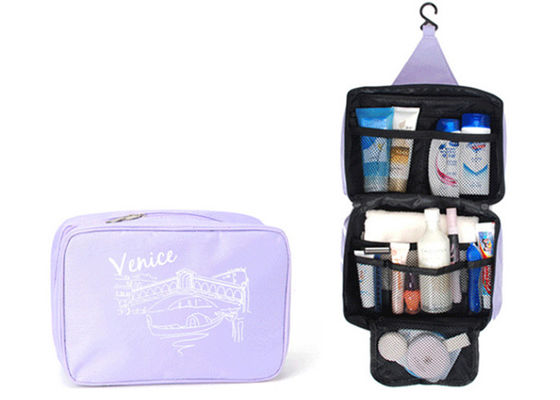 La lona azul cuelga para arriba el bolso del artículo de tocador, bolso del maquillaje del viaje con la impresión de encargo